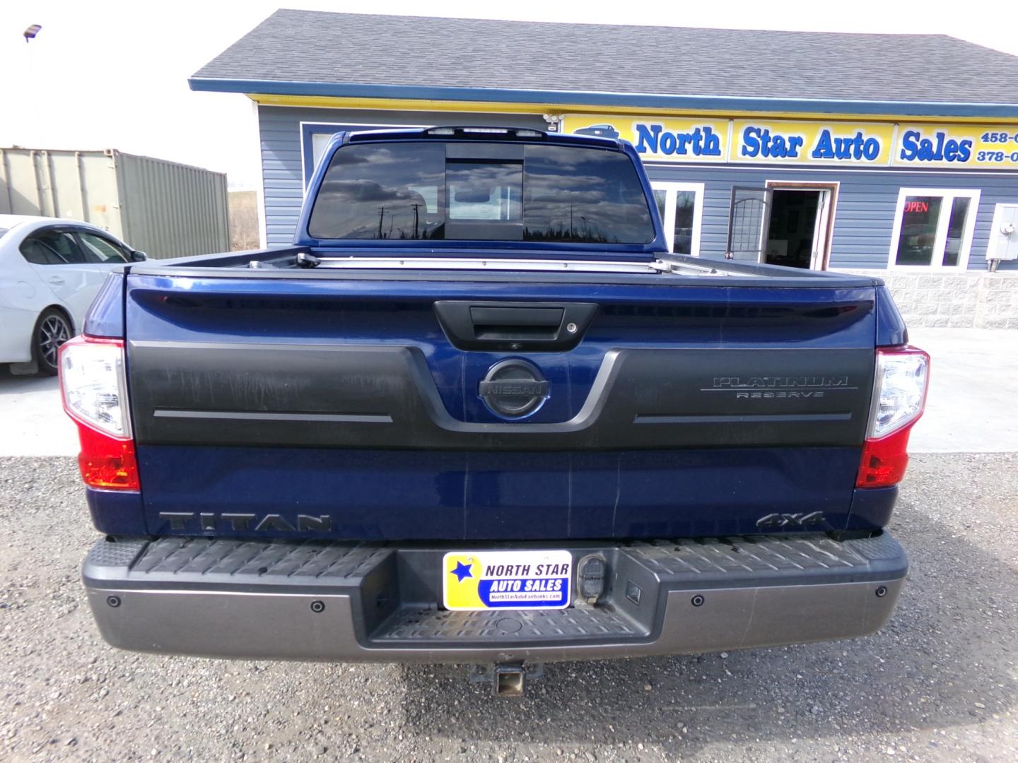 2017 /Black Nissan Titan Platinum Reserve Crew Cab 4WD (1N6AA1E52HN) with an 5.6L V8 DOHC 32V engine, 6A transmission, located at 2630 Philips Field Rd., Fairbanks, AK, 99709, (907) 458-0593, 64.848068, -147.780609 - Photo#3